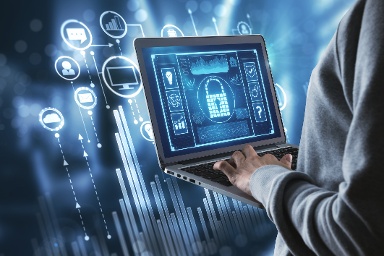 person using a laptop depicting digital security